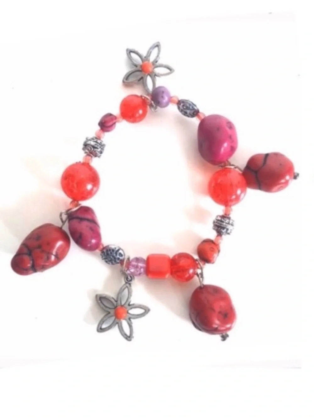 Handcrafted artisan red and burgundy stones paired with silver flowers bracelet